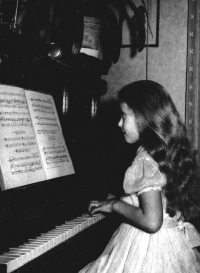 Věra Teplá during piano lessons, 1963