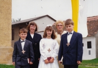 Jaroslav Ostrčilík (far right), siblings, mother and neighbour, first communion in Austria, 1990s