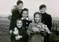 Klaus (bottom left) with his siblings, 1949