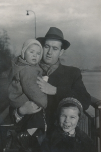 Ilja Květoň as a child in his father's arms, pictured with his sister
