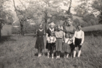 Children with their mother in Kačerov, 1955