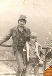 With son during a trip, 1980s
