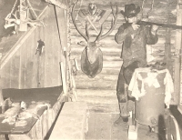 A friend called Jack inside a tramp hut, 1970s