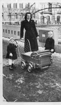 Mother Eleonora, Countess Bubna-Litic, with witness's sisters Markéta (right) and Monica (left) and Petr Dujka in the pram, 1951