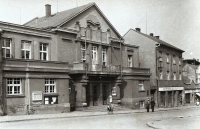 Jaroslav Špaček, in the middle in front of the Sokol Hall, on the left his parents' stationery shop, 1948