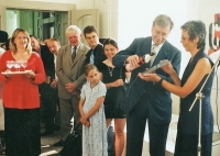 Anna Fassatiová (left) and Count Zdeněk Sternberg christening the new logo of the Museum of Art and Design in Benešov, 1990