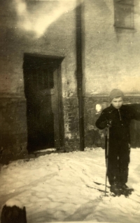 Outside the entrance to their house, 1940s
