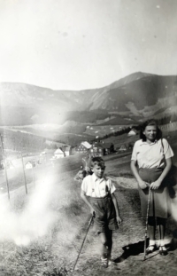 Josef Bartík with his older sister on a family trip in the Krkonoše Mountains, 1940s