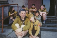 Mirko Juna as a leader of a scout camp with a firefly (brownie) and other scouts in Bohemian Paradise in 1993