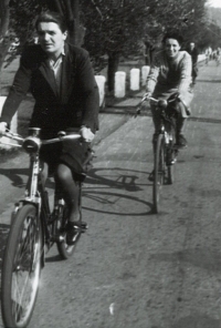 Růžena Nováková's mother on the bicycle she used during the war to carry supplies from the farm in Smederov to Prague