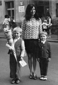 Witness (right) with his mother and older brother, 1972
