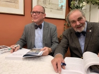 Signing of the book Iconography of the Charles Bridge with co-author Prof. Jan Royt, 2024