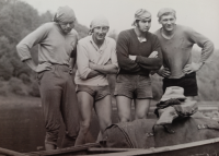 The witness (third from left) with friends on a canoeing trip