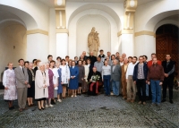Employees of the Hradec Králové Diocese, Marie Strnadová in the middle in a blue skirt suit, Hradec Králové, 1990s