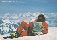 Petr Strnadel at the top of Mont Blanc holding the Region weekly, 1996
