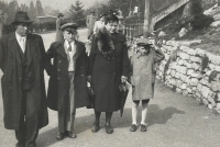 Jiří Junek with his mother, older brother and coachman (left) in Prague zoo, ca. 1940