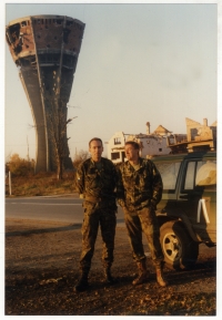 Photo in front of the water reservoir in Vukovar, 1996