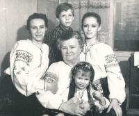 Grandmother Ekaterina Samoilovna Gachenko with her grandchildren, Viktoria is on the right. All of them in embroidered shirts (embroidered shirts) that grandmother embroidered herself, Kiev, 1990