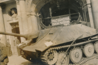 Tank in front of the Prague Municipal Life Insurance Company on Old Town Square