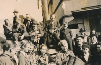 People celebrating the end of World War II in the streets of Prague