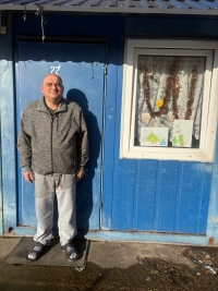 Juraj Kuzma in front of the portable cabin that serves as a 'classroom' for children from the marginalized community on Kasárenská Street in Trenčín