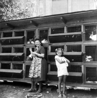 Jitka Havránková's sister Alena with the housekeeper in front of the rabbit hutch within the mill