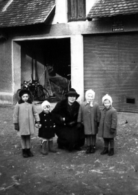 Right to left: Jitka Havránková, sister Alena and cousins in the mill yard