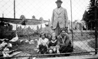 Father František Havránek; left to right: daughter Jitka, her sister Alena and their mother Marie in the front garden of the villa in Pečky