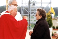 Marie Strnadová receiving the Blessed Sacrament from the hands of Pope John Paul II, Prague 1997