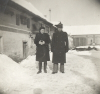 The Štamfests in the yard of their farmhouse