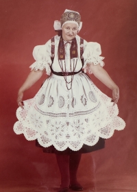 Vlasta wearing a Tábor folk costume embroidered by her mother and later sold to the USA