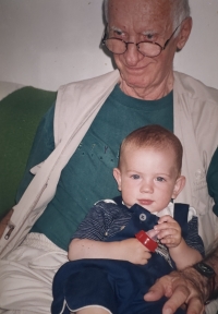 Father Jiří Fišer with his grandson