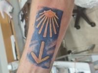 Tattoo of Ladislav Drahoš with the symbol of the St. James Way