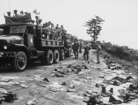 American convoy transporting North Korean prisoners of war to their reception centre, Pyeongchang, Korea, 1953