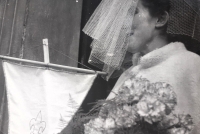 Bride Ludmila Müllerová with a scout lily, 1971