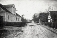 Main road leading through Jamnice, view from Vlaštovičky. Gross's farm on the left, Reichl's cottage on the right, the chapel can be seen in the background, 1952