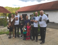 With son Petr's family (left), Vlasta the mother of the sons, and son Pavel's family (right), Šlovice 2000