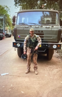 On a mission in front of a Tatra vehicle