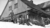Josef Šedivec playing the guitar in front of the Klášterka chalet in the Giant Mountains, 1960s