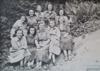Bohumila Coufalová with her colleagues in the yard of the tobacco factory in Jihlava (second half of the 1940s) - bottom row in the middle