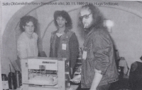 Radek Hrdlička (left) at the headquarters of the Civic Forum in Chomutov, in a photograph by Hugo Sedláček, November 1989
