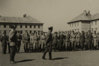 Ladislav Tonar as a company commander in Uherské Hradiště, standing behind the gentleman in the foreground on the left with a cap, mid-1950s