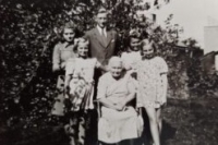 With relatives. Eva Rajmonová (Cihlářová) standing in the second row from the bottom on the left, 1st half of the 1950s