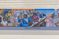 Judy Baca's mural commemorates a protest against racial segregation in an Atlanta restaurant that the witness attended as a youth, during which the protesters were doused with hot coffee. This dramatic scene will now be part of the famous mural The Great Wall of Los Angeles in the San Fernando Valley
