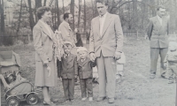 Mr. Rajm and Mrs. Rajmová at the celebration with their approximately four-year-old son Vladimir