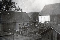 Storing hay in the yard of the Tomášů farm before 1948