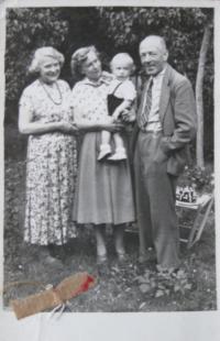 Family photo that the witness kept in prison - parents, wife Marie with their son