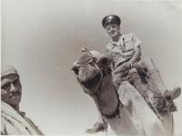 Hofrichter on camel in Middle East (1940-1)