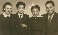 c. 1949; with his parents and sister