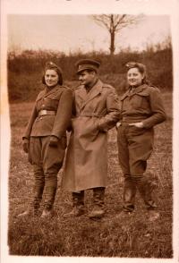Emilie Řepíková in December 1944, she is standing to the right. She is accompanied by Nataša Hricuková, née Suchardová, and officer Čech